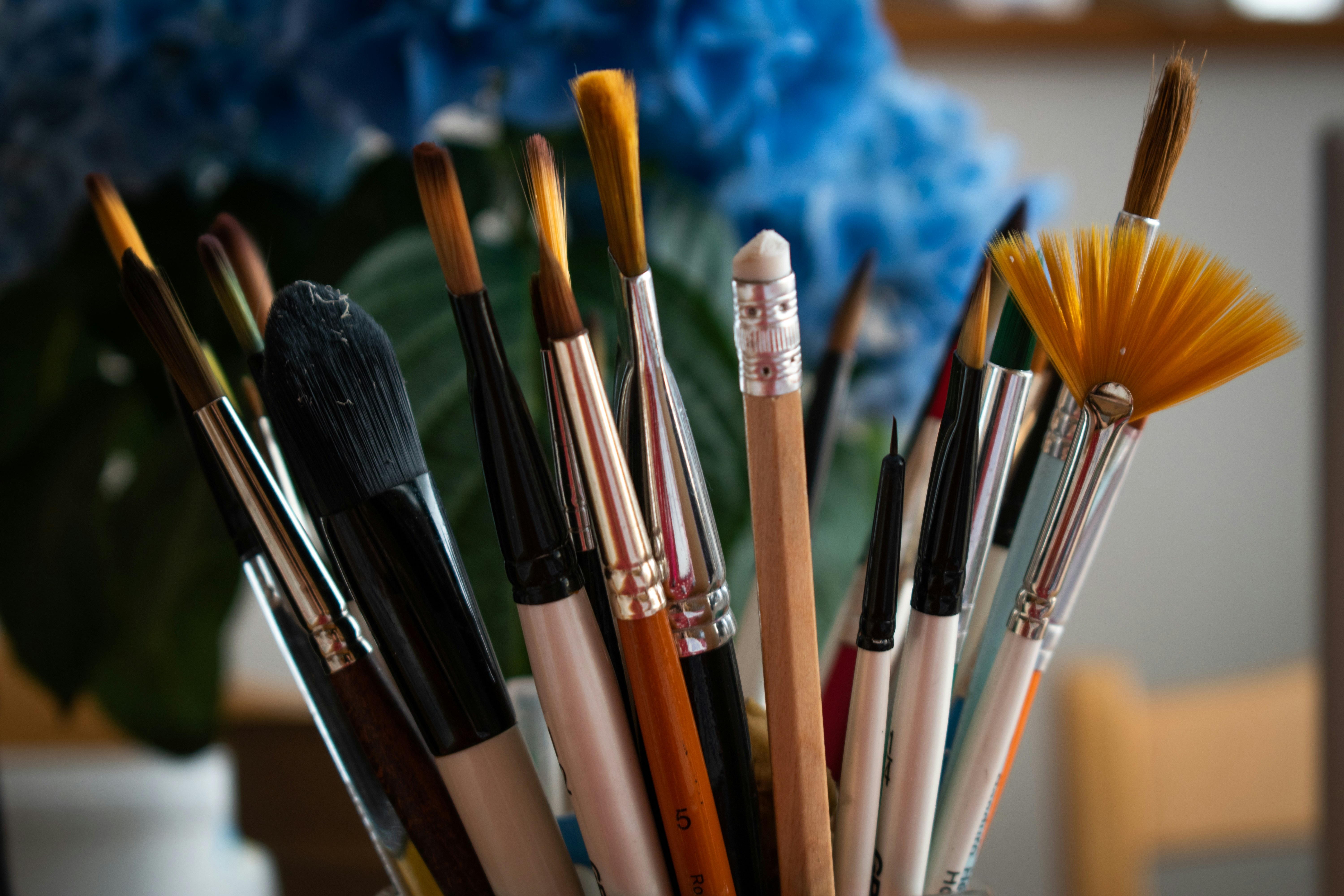 watercolour brushes in a vase