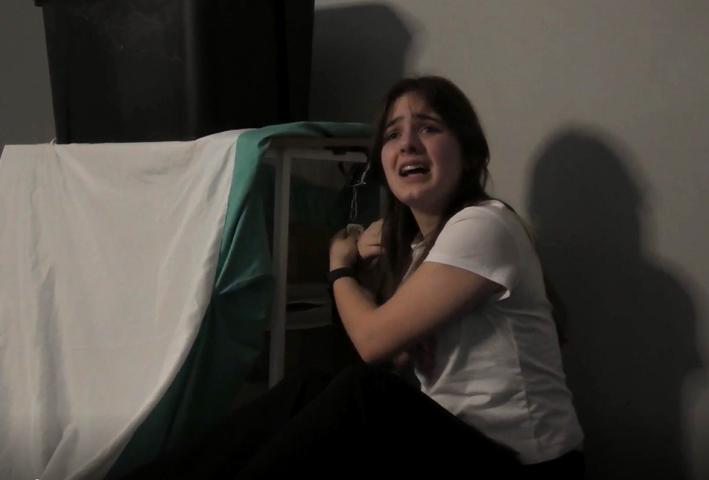 A person pulling back in fear