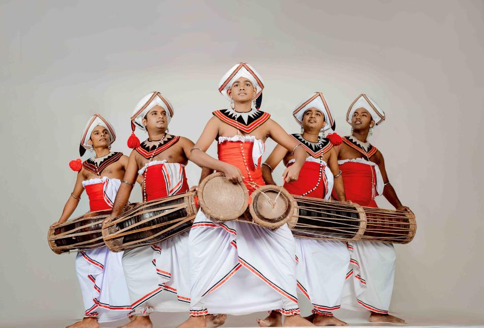 Five drummers in a line.