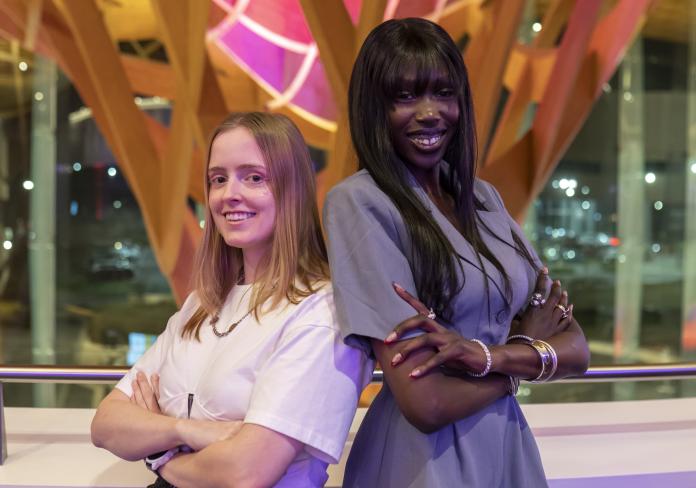 Grid Series 2025 - Martha & Jordz, two women pose back to back