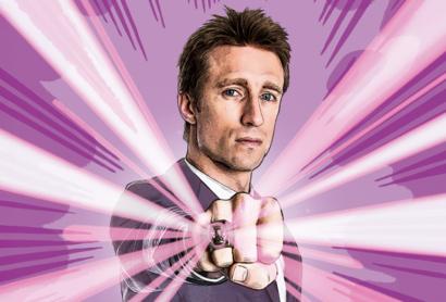 A man holds his fist to the camera - and illustrated rays shine out from a ring on his finger